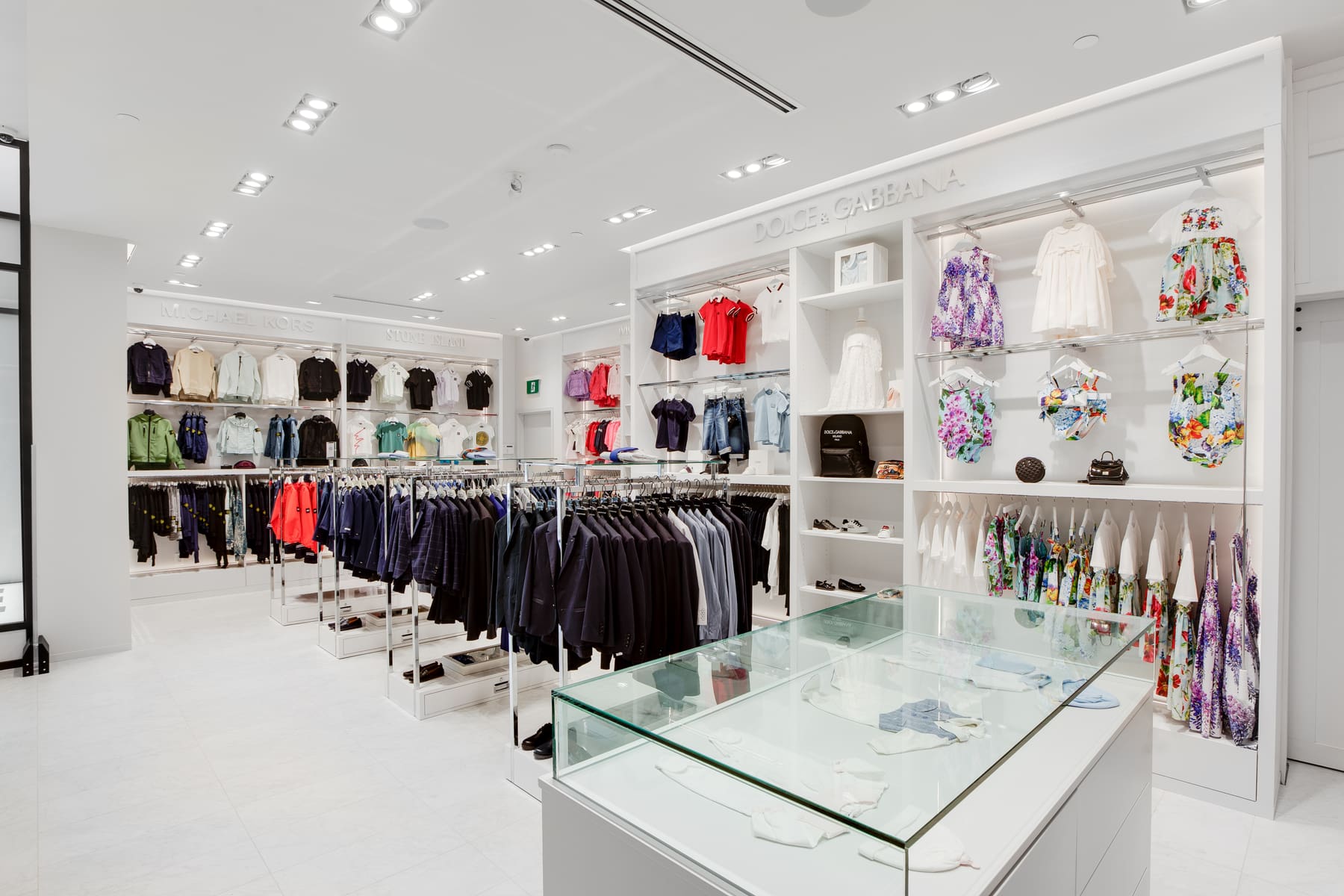 Bright boutique with lit merchandise displays